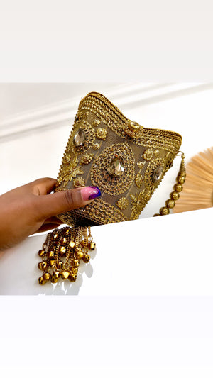 Coco Medallion Clutch